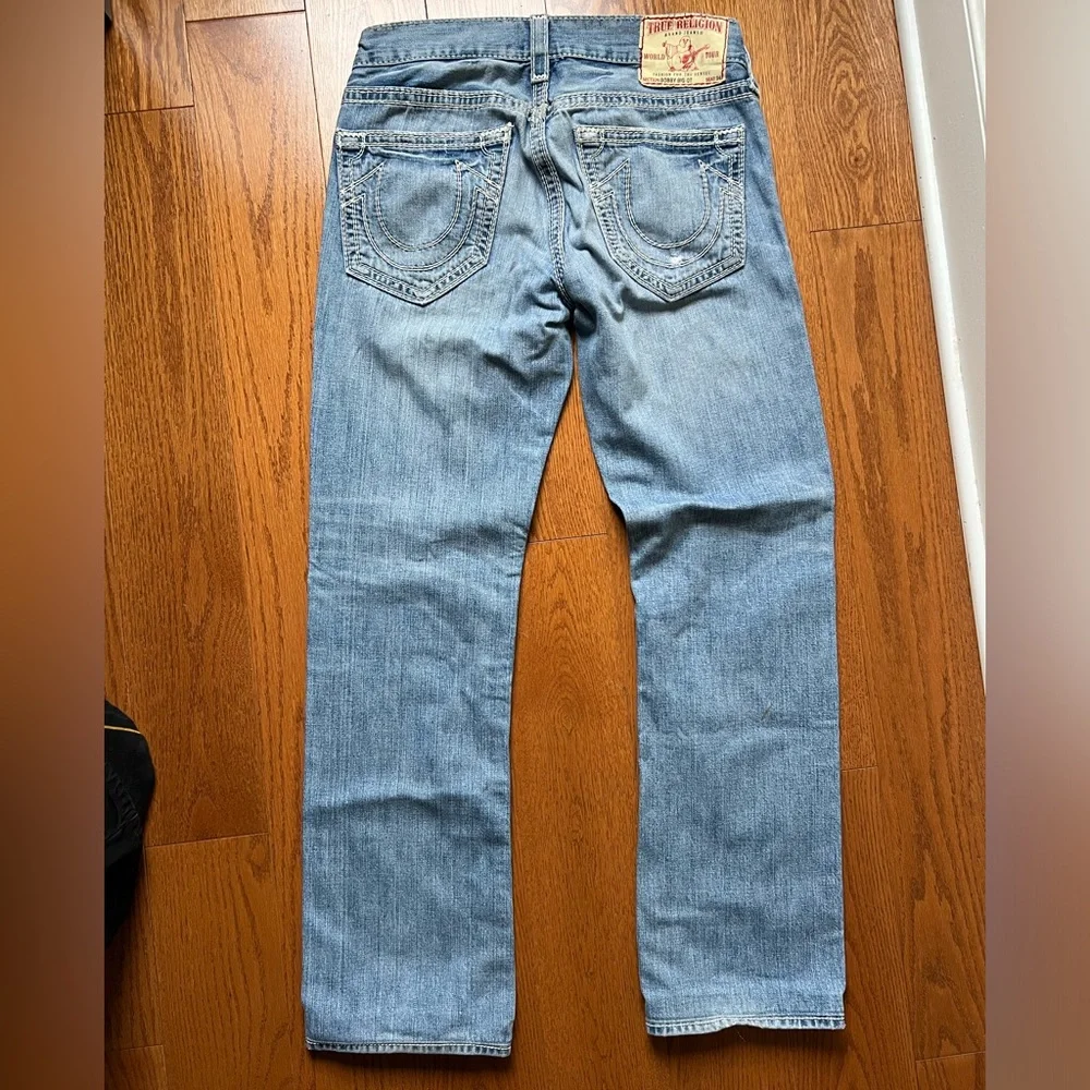 • True Religion Light Blue Distressed Men’s Jeans